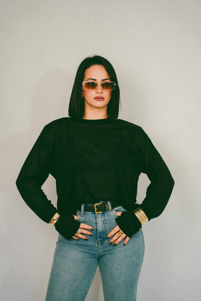 Maglia semitrasparente spallina nera